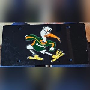 Miami Hurricanes Glitter Black acrylic license plate. Pre-owned. Stockdale.